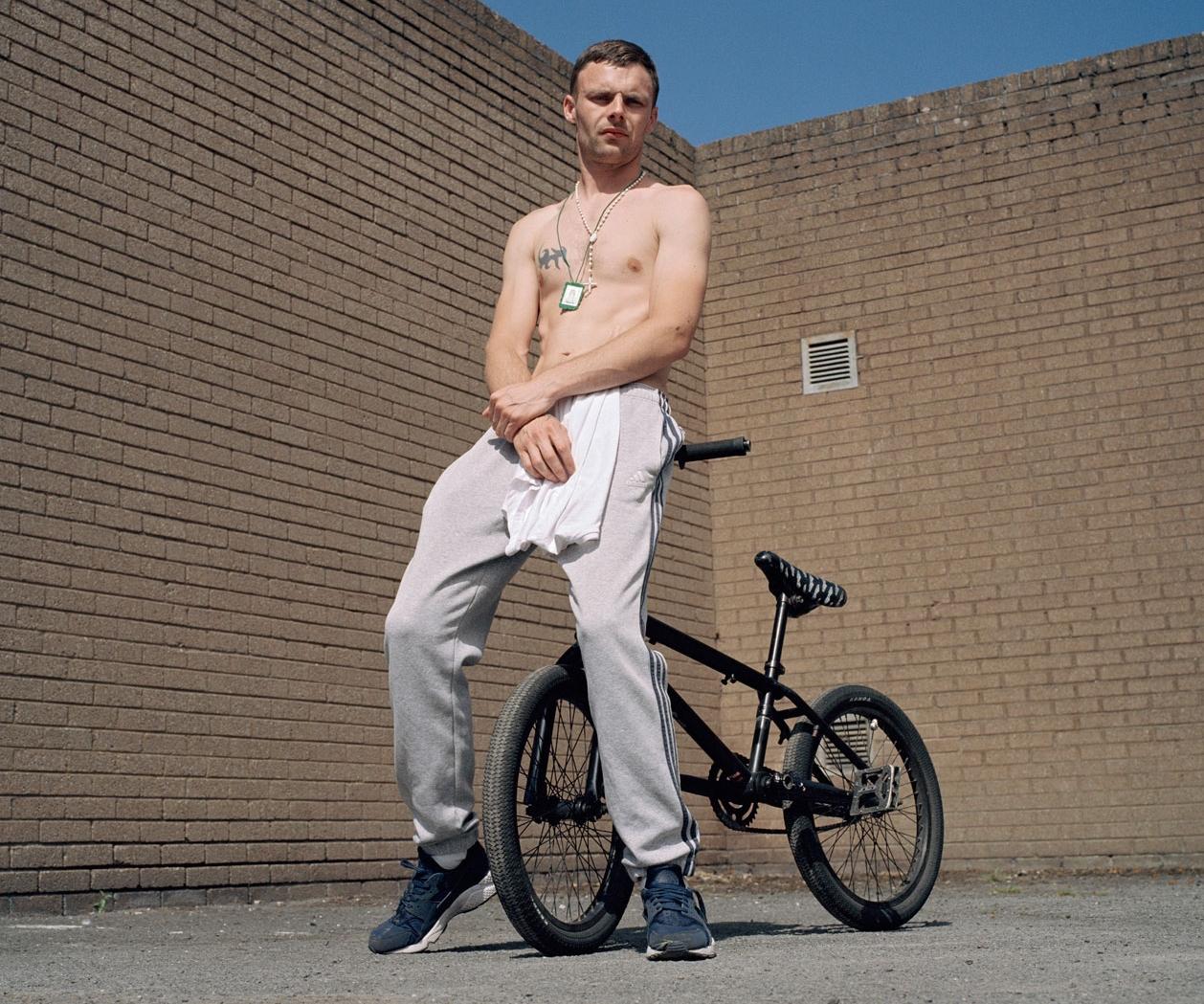 Stephen. <br> Too Hot for Tops<br>is a study of men who <br> venture onto Dublins streets <br> unselfconsciously bare-chested <br> on a summers day. <br> 1 of 20 